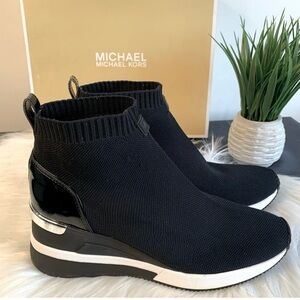Michael Kors slip on ankle boots.